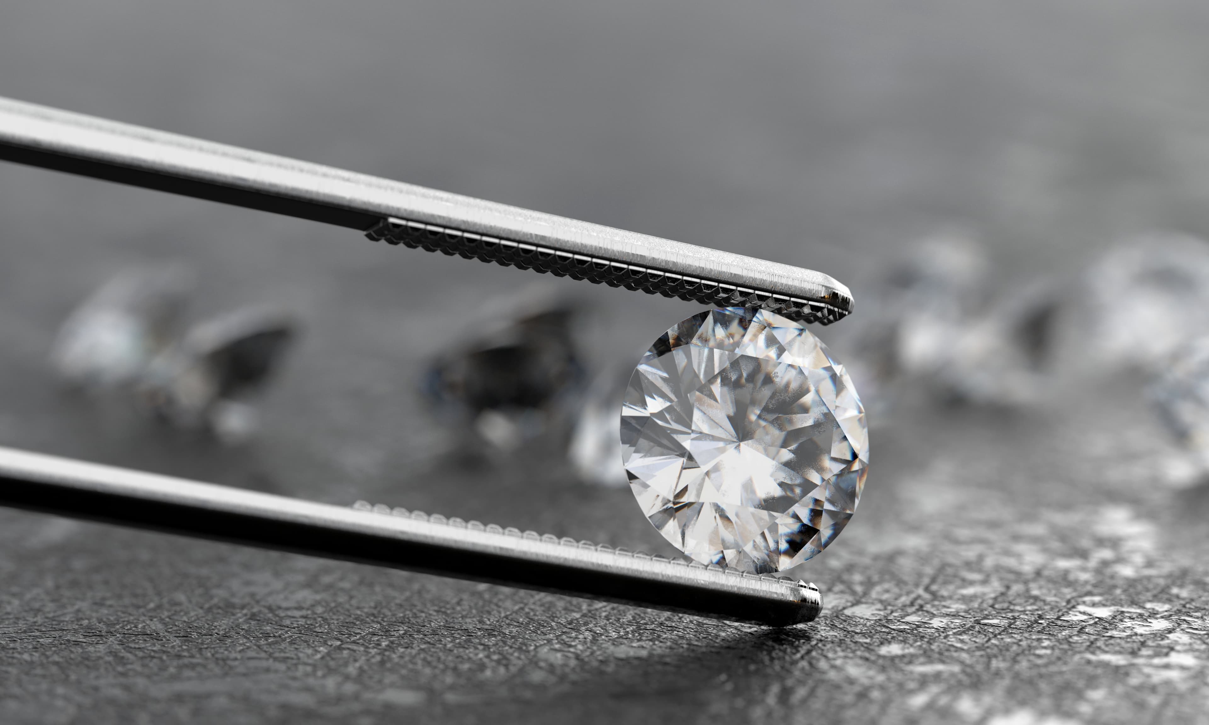 Polished diamonds on a cutting machine